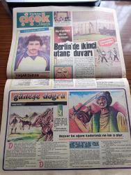 Türkiye Çiçek Magazin Gazetesi - 24 Mayıs 1984 - köydeki ağları İstanbul'da hamallığa tercih ediyorlar - tepeköy'ünde Ağalığı bırakıp İstanbul'a hamallık yapmaya gelen Ahmet Uzun Fotoğrafı - elimizde evimizde bomba tüpgaz için tedbirli olalım - hemen her evde bulunan tüp gazlar yanlış kullanma halinde facialara yol açıyor - At arabasında tüp gaz taşıyanlar Fotoğrafı - tarih yazan Ethem Kırçın - İlk ezanı okuyan Bilal Habeşi Resulullahın bütün gazalarında bulundu Allahu Ekber - Volter bir eserinde manevi değerlerimizle alaya kalkışmıştı Abdülhamit Han'ın ultimatomu tesiri anında gösterdi - hayatım Roman köşesi - Kurtoğlu yazan çizen C. Cemil Ertürk - Yolun Sonu oynayanlar Aslan Yenihayat Seda Sevinç Faruk Yıldız reji ve senaryo Tevfik Çakmak kamera Nevzat Takmaz Foto Roman - futbolcular albümü Fenerbahçeli Yaşar Duran Fotoğrafı - Berlin'de ikinci utanç duvarı Fotoğrafı - güneşe doğru yazan Cemalettin Cem Ertürk Yazı Dizisi - Doğu Almanya tarafında yapılan duvar 200 kilometre