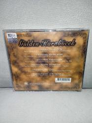 CD Gülden Karaböcek klasikler 2 bestelerim ve ben albümü. Dilek taşı Sürünüyorum kırılsın ellerim ağlıyorsam yaşıyorum... Orijinal. Disk 10 üzerinden 9,5 sorunsuz çalışıyor koleksiyonluk