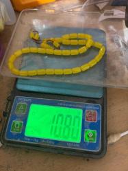 Osmanlı sıkma kehribar tespih habbeden büyük üstat Faruk yağmur usta eseri imzası üzerinde Osmanlı sıkma tespih