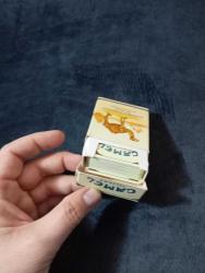 Camel sigara Temalı iskambil Oyun Kartları Seti vintage. Camel temalı kutusunda, koyu camel renklerde standart oyun kartları ve jokerler içeren oyun seti.  56 kart ve kutusundan oluşmakta  çok iyi durumda