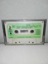 Kaset Fatoş seni nasıl özledim görünce deli gibi Dünya handır Tanrım beni Baştan yarat Kara vicdanlı ormancı... Orijinal. Minareci 3081 Alman baskı. Kartoneti yok. Kaset sorunsuz çalışıyor
