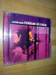 feridun düzağaç uzun uzun cd (çift disk; her iki diskte de 20-30 adet kadar kılcal çizik var; performansı etkiler mi bilemedim)