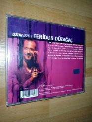 feridun düzağaç uzun uzun cd (çift disk; her iki diskte de 20-30 adet kadar kılcal çizik var; performansı etkiler mi bilemedim)