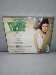 CD Yıldız Tilbe yürü anca gidersin albümü. orijinal. dinlemeyi etkilemeyen çizikler var, baştan sona sorunsuz çalışıyor