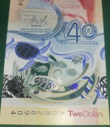 DOĞU KARAYİPLER  2 DOLAR  POLİMER ÇİL