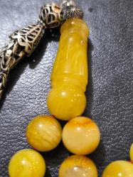 Orjinal damla kehribar kaya patinleri üzerinde tam 21 gram 20 grama yakın gümüş püskül gram