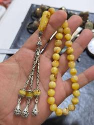 Orjinal damla kehribar kaya patinleri üzerinde tam 21 gram 20 grama yakın gümüş püskül gram