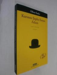 LOT.5 » Karısını Şapka Sanan Adam