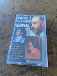 DEYİŞLERLE HALK MÜZİĞİ KERVANI 2 - ARİF SAĞ / GÜLER DUMAN / MUSA EROĞLU / MUHLİS AKARSU / ALİ KIZILTUĞ / ŞÜKRAN YILDIRIM / YAŞAR AYDIN  - KASET (JELATİNİNDE)