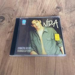 Nida - Evimizin Gelini Vurmasaydın Cd ( Dinlemeye engel olmayan kılcal çizikler vardır ) ( Dönem Cd - Sarı Bandrol )