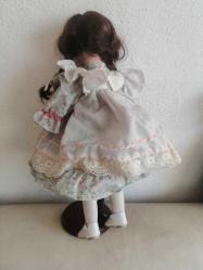 40 cm PORSELEN BEBEK ÖRGÜLÜ SAÇLI GÜLÜMSEYEN BEBEK ÇOK TATLI KUSURSUZ GÜZEL STAND SATIŞ DIŞI