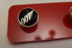 ÇOK NADİR. JAMES BOND FİLMLERİNDE KULLANILAN KOL DÜĞMELERİ. İNGİLTEREDEN ALINDI. SIFIR.