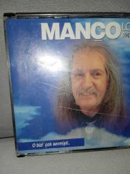 Cd Barış Manço mançoloji 1 ve 2 box albüm. 1999 baskı Orijinal. Kitapçık mevcut. CD kabında çatlaklar var. 2 Disk. Dinlemeyi etkilemeyen çizikler var, Sorunsuz çalışıyor