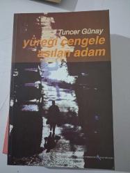 YÜREĞİ ÇENGELE ASILAN ADAM