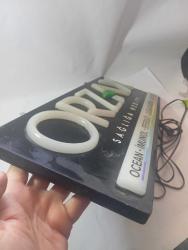 orzax ışıklı tabela . çalışır durumda. uzun kablosu var 55x21cm