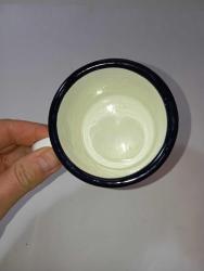 Emaye talisker viski kupası. Ürün kullanılmamış olup atık yoktur. Ancak alt kısımda sararma var.  Resimlerdeki haliyle koleksiyon Dekorluk kullanımlık