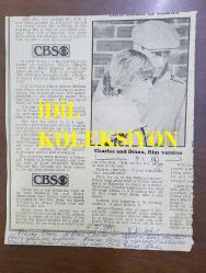 PRENSES DIANA'NIN FOTOĞRAFLI DERGİ SAYFASI - A MAGAZINE CLIPPING OF PRINCESS DIANA - 19 x 15 cm EBADINDA - İNGİLİZCE DERGİDEN - ACTORS DAVID ROBB AND CAROLINE PLISS SPENT HOURS RE-CREATING THE FAMOUS WEDDING KISS BETWEEN PRINCE CHARLES AND PRINCESS DIANA - OYUNCULAR DAVİD ROBB VE CAROLİNE PLİSS, PRENS CHARLES VE PRENSES DİANA'NIN ÜNLÜ DÜĞÜN ÖPÜŞMESİNİ YENİDEN CANLANDIRMAK İÇİN SAATLER HARCADILAR.