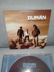 CD Duman seni kendime sakladım albümü. Orijinal 2005 baskı. Dinlemeyi etkilemeyen çizikler var, sorunsuz çalışıyor. kartonet temiz