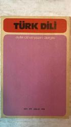 TÜRK DİLİ, AYLIK DİL VE YAZIN DERGİSİ - ARALIK 1974  SAYI: 279  TDK: TÜRK DİL KURUMU ÜZERİNE SORULAR VE YANITLAR - ATTİLA İLHAN: ŞİİR ÜZERİNE SORUSUZ KARŞILIKLAR - ATTİLA İLHAN: GÖZLÜKLÜ HAMDİ'NİN NOTLARI - KEMAL DEMİRAY: BİR YAZIM SORUNU: DE BAĞLACI - ALİM ŞERİF ONARAN: SİNEMADA DİL - SALAH BİRSEL: BOĞAZİÇİ YANDAN YANDAN - FAZIL HÜSNÜ DAĞLARCA: MUMLAR - NECATİ CUMALI: KÖSTEBEK - METİN ELOĞLU: ALACA - ALİ PÜSKÜLLÜOĞLU: SORULAR - HALUK AKER: SEVGİYİ AÇITIR DÜNYA - HALİL UYSAL: BOZYAZI - ÖZEL ARABUL: SU YANGINI - ENVER NACİ GÖKŞEN: ÇIKMA DURUMU (-DEN) VE KAPSAMI - CAHİT ÖZTELLI: KOLAY SANILAN HALK EDEBİYATI - MEHMET SEYDA: ROMANCI GÜNLÜĞÜ - TERİM SÖZLÜKLERİMİZDEN ÖRNEKLER - BURHAN ARPAD: KEMAL AĞABEY ÖLDÜ - SAADET TIMUR ULÇUGÜR: BEKİRLER - MUZAFFER IZCÜ: ÜZERİNİZDE ESKİSİN BAYRAM ALİ BEY - YAMAN ÖRS: TİP DİLİNİ SADELEŞTİRME ÇABALARI - MUZAFFER UYGUNER: TÜRK FELSEFESİNİN BOYUTLARI - EMİN RECEBOĞLU: DÜNYA ŞİİRİ -  60 SAYFA