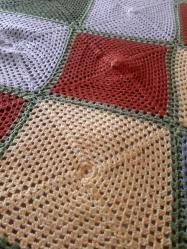 El orgü yün yatak örtüsü