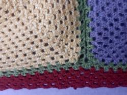 El orgü yün yatak örtüsü