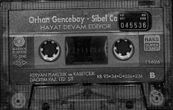 Orhan Gencebay / Sibel Can - Hayat Devam Ediyor Kaset (Bordo Bandrol - İkinci El) KST27837