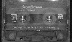 Orhan Gencebay - Nostalji 1 (Bir Teselli Ver) Kaset (Harika Kasetçilik - Kırmızı Bandrol - İkinci El) KST27955