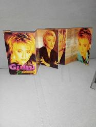 Kaset Güllü kırılırım albümü. Orijinal 1998 baskı. Kartonet hafif yorgun, kaset sorunsuz çalışıyor.