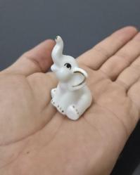 94. MİNYATÜR PORSELEN ŞANS FİLİ. İLANLARIMI İNCELEYİNİZ