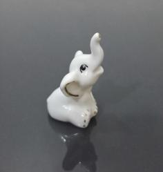 94. MİNYATÜR PORSELEN ŞANS FİLİ. İLANLARIMI İNCELEYİNİZ