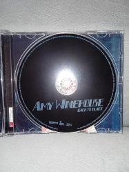 Cd Amy Winehouse back to black albümü. Orijinal. Dinlemeyi etkilemeyen çizikler var. Sorunsuz çalışıyor koleksiyonluk