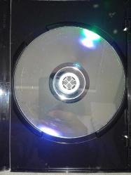 Dvd Batman the dark knight kara şövalye. İki diskli Özel Versiyon. Orijinal. Türkçe dublaj ve altyazı seçenekli. 2 disk. Disk 2 temiz. Disk 1 de çalışmasını etkilemeyen çizikler var. Sorunsuz çalışıyor