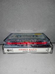 Kaset Ahmet Kaya Şafak türküsü albümü. Orijinal.1987 Taç plak dönem Kağıt Baskı. Sorunsuz çalışıyor. Temiz koleksiyonluk