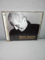 Cd İlhan Şeşen neler oluyor bize albümü. Orijinal. Kartonet tertemiz. Disk 10 üzerinden 9.5 sorunsuz çalışıyor koleksiyonluk