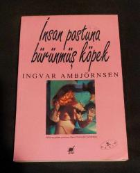 İNSAN POSTUNA BÜRÜNMÜŞ KÖPEK