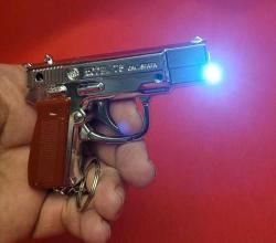 LAZERLİ FENERLİ METAL TABANCA MASKOT. SIFIR. KULLANILMAMIŞ.