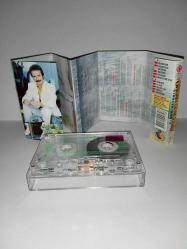 Kaset Orhan Gencebay Dünya albümü. Orijinal. kervan plak 1996 baskı, kırmızı bandrollü dönem albümü. sorunsuz çalışıyor koleksiyonluk