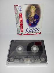 Kaset Güllü yalan sevgiler albümü. Orijinal kırmızı bandrollü albüm.