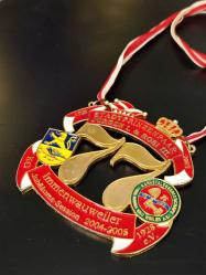 Immenwauweiler Karnaval Derneği'nin 2004-2005 yılına ait özel bir karnaval madalyasıdır.