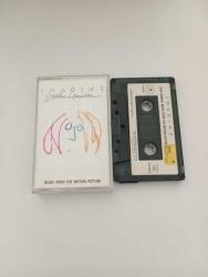 John Lennon , İmagine , Kaset 1	John Lennon–	Real Love A2	The Beatles–	Twist And Shout A3	The Beatles–	Help! A4	The Beatles–	In My Life A5	The Beatles–	Strawberry Fields Forever A6	The Beatles–	A Day In The Life A7	The Beatles–	Revolution A8	The Beatles–	The Ballad Of John And Yoko A9	The Beatles–	Julia A10	The Beatles–	Don't Let Me Down A11	The Plastic Ono Band–	Give Peace A Chance B1	John Lennon & The Plastic Ono Band–	How? Featuring – The Flux Fiddlers B2	John Lennon–	Imagine (Rehearsal) B3	John Lennon & The Plastic Ono Band–	God B4	John Lennon–	Mother B5	John Lennon–	Stand By Me B6	John Lennon & The Plastic Ono Band–	Jealous Guy Featuring – The Flux Fiddlers B7	John Lennon–	Woman B8	John Lennon–	Beautiful Boy B9	John Lennon–	(Just Like) Starting Over B10	John Lennon & The Plastic Ono Band–	Imagine