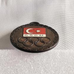 G.S.G.M. - OLİMPİYAT AMBLEMLİ BRONZ RENKLİ MİNELİ MADALYA