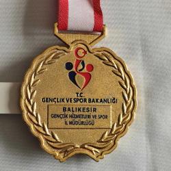T.C. GENÇLİK VE SPOR BAKANLIĞI - ALTIN RENKLİ MADALYA