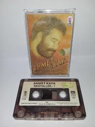 Kaset Ahmet Kaya Resitaller 1 albümü. Orijinal 1988 dönem Kağıt Baskı. Sorunsuz çalışıyor. koleksiyonluk