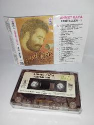 Kaset Ahmet Kaya Resitaller 1 albümü. Orijinal 1988 dönem Kağıt Baskı. Sorunsuz çalışıyor. koleksiyonluk