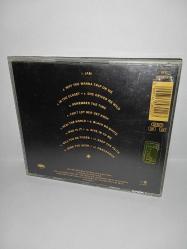 CD Michael Jackson Dangerous albümü. Orijinal. Avusturya dönem baskı. Kartonet 10/9. Cd de dinlemeyi etkilemeyen çizikler var, sorunsuz çalışıyor.