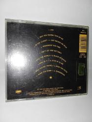 CD Michael Jackson Dangerous albümü. Orijinal. Avusturya dönem baskı. Kartonet 10/9. Cd de dinlemeyi etkilemeyen çizikler var, sorunsuz çalışıyor.