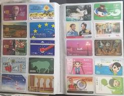 Dosya içinde 450 adetten fazla Yabancı  telefon  kartı