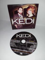 CD Grup KEDİ aptal / aşk var mıdır? Ceren Taçan , Özkan Atilla Tokcan. Orijinal. Dinlemeyi etkilemeyen çizikler var sorunsuz çalışıyor. Nadir koleksiyonluk