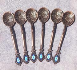 NAZAR BONCUKLU KABARTMA DESENLİ BAKIR RENKLİ 6'LI ÇAY KAŞIĞI.  YENİ