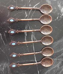 NAZAR BONCUKLU KABARTMA DESENLİ BAKIR RENKLİ 6'LI ÇAY KAŞIĞI.  YENİ